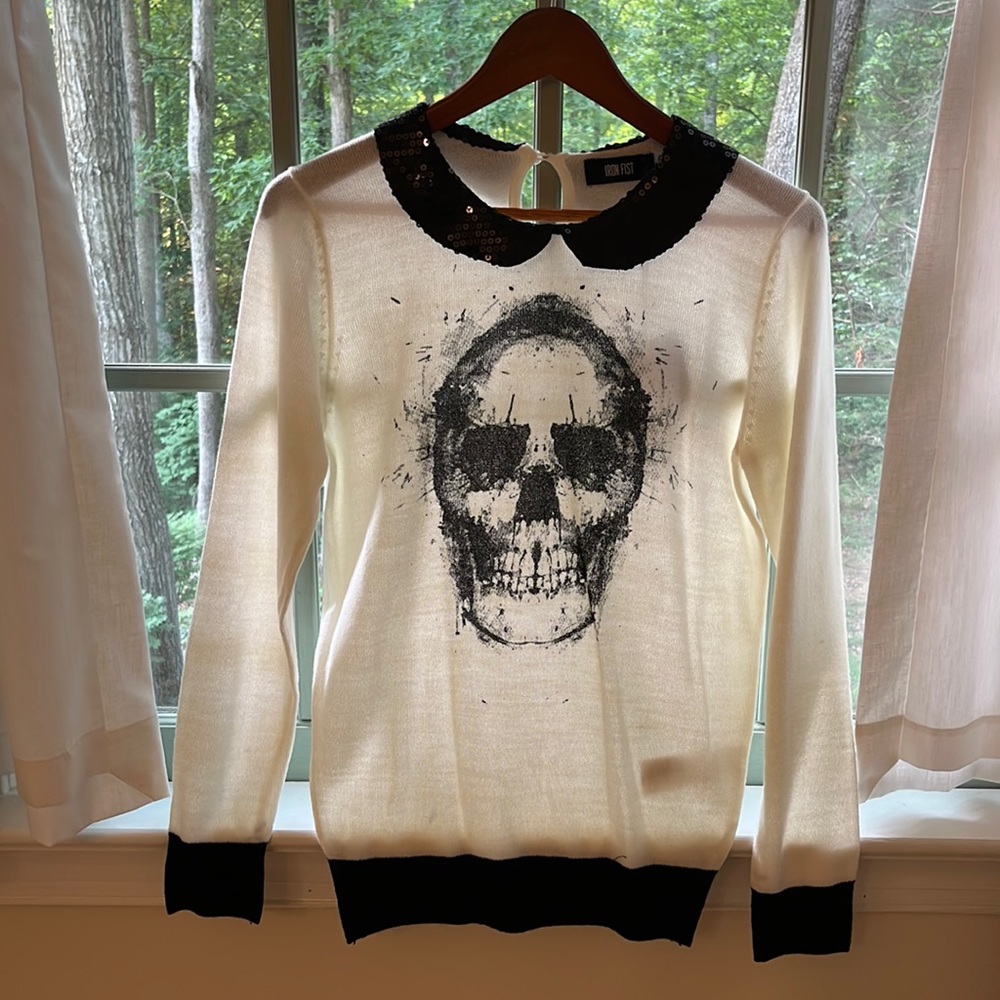 Iron Fist size small, cream and black skull sweater.